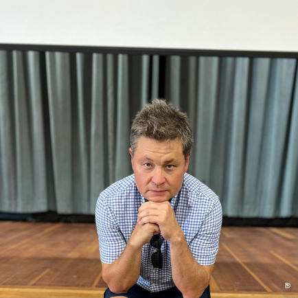 Teacher with students in a classroom